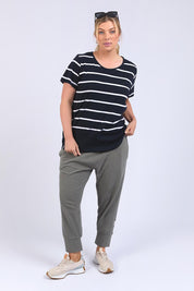 A model wearing the Fundamental Rib Short Sleeve Stripe Cotton Tee in colour Navywhite (Blue), from the front, showing the whole outfit