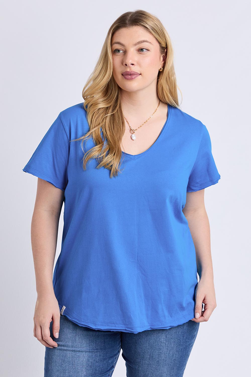 Model Genericm wearing size sample of the Fundamental Pima Cotton Vee Tee - Azureblue in colour Azureblue, in a cropped view