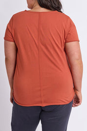 Model Genericm wearing size sample of the Fundamental Pima Vee Tee – Earthbrown in colour Earthbrown, from the back