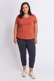 Model Genericm wearing size sample of the Fundamental Pima Vee Tee – Earthbrown in colour Earthbrown, from the front