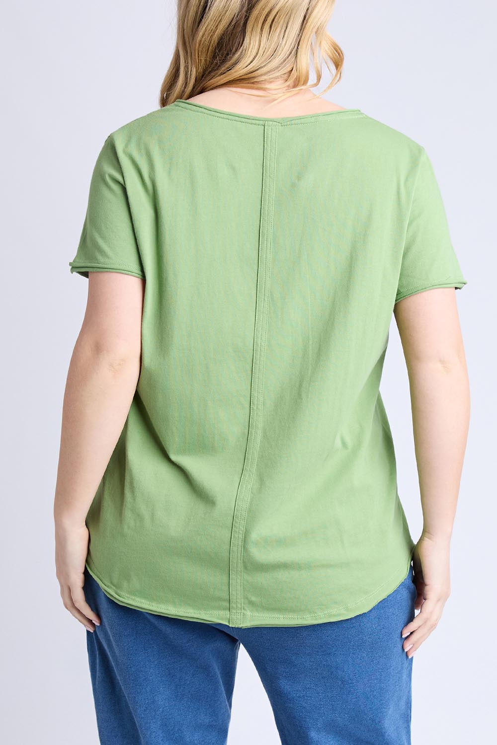 A model wearing the Fundamental Pima Cotton Vee Tee in colour Forest (Green), from the back