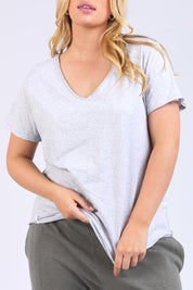 A model wearing the Fundamental Pima Cotton Vee Tee in colour Greymarle (Grey), from the front, cropped image