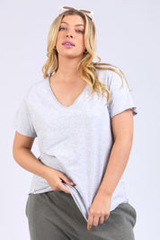 A model wearing the Fundamental Pima Cotton Vee Tee in colour Greymarle (Grey), from the front, cropped image