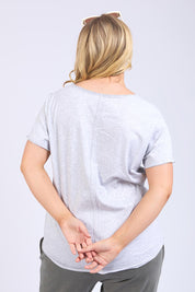 A model wearing the Fundamental Pima Cotton Vee Tee in colour Greymarle (Grey), from the front, cropped image