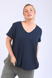 A model wearing the Fundamental Pima Cotton Vee Tee in colour Navy (Blue), from the front, cropped image