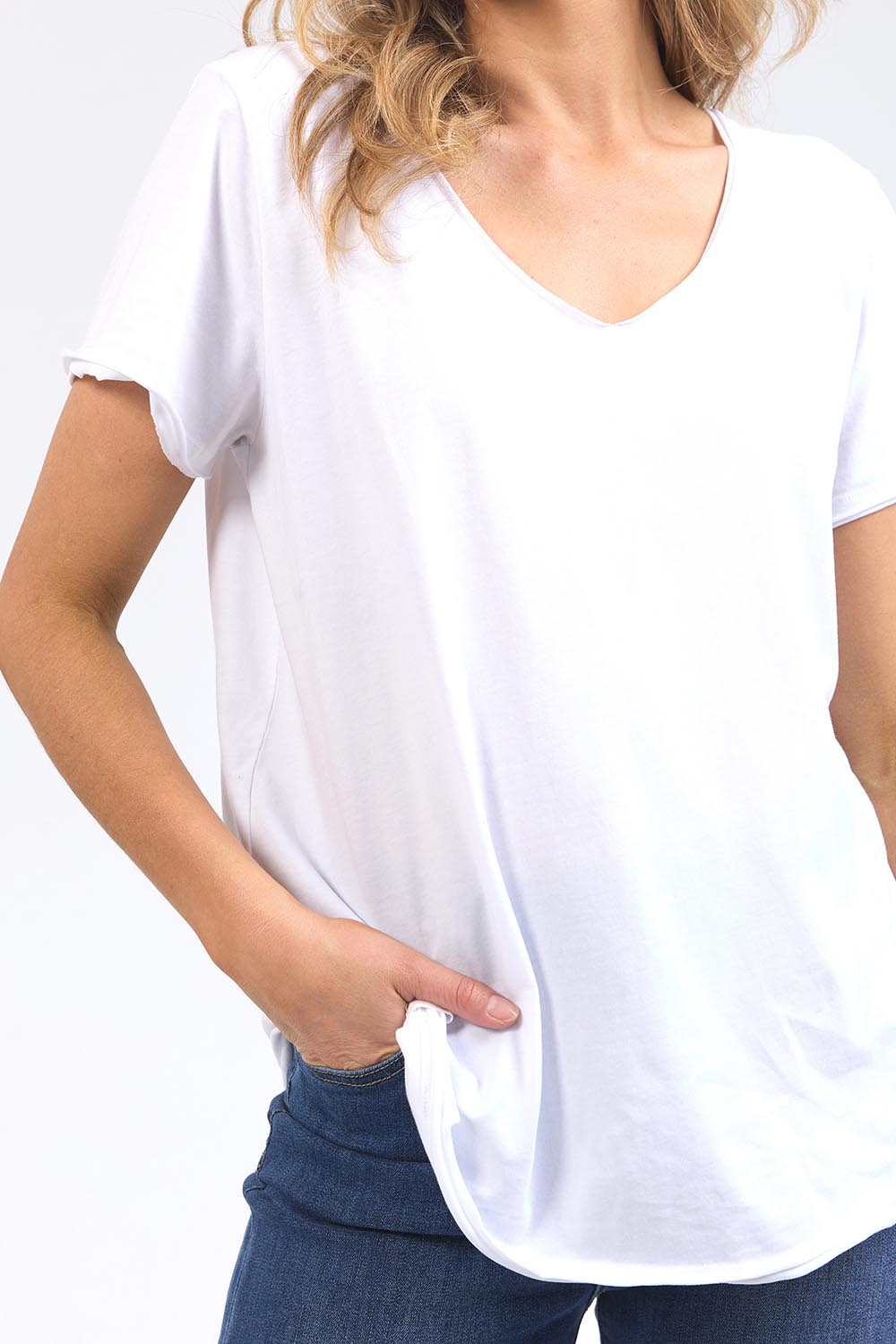 A model wearing the Fundamental Pima Cotton Vee Tee in colour White (White), from the front, cropped image