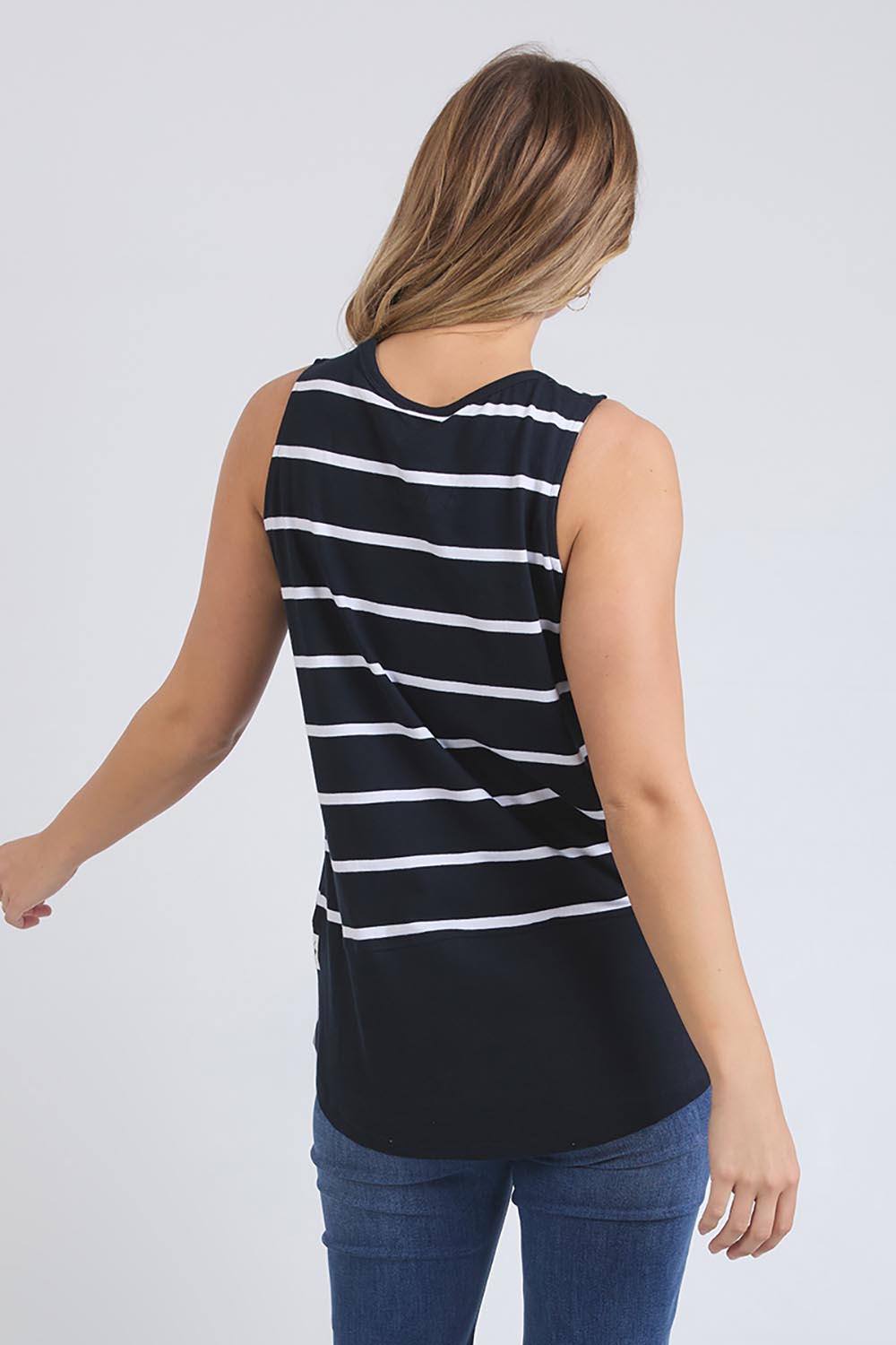 A model wearing the Fundamental Rib Stripe Cotton Tank in colour Navystripe (Blue), from the back