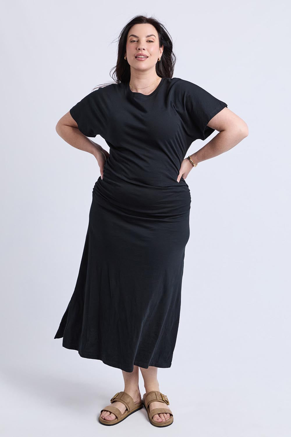 A model wearing the Fundamental Colette Cotton Dress in colour Black (Black), from the front, showing the whole outfit
