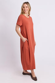 Model Genericm wearing size sample of the Fundamental Diana Cotton Tee Dress - Earth in colour Earth, from the front