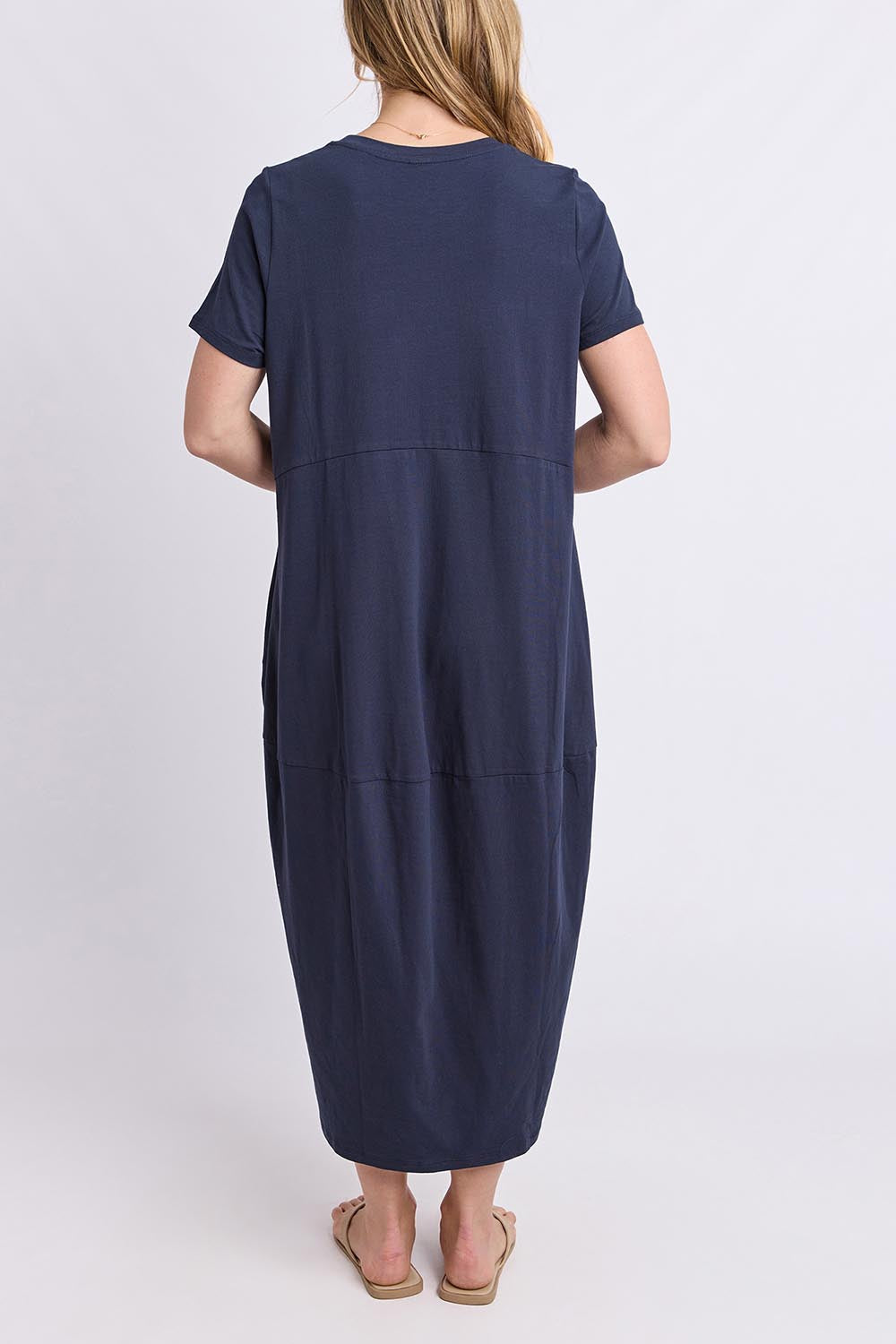 Model Genericm wearing size sample of the Fundamental Diana Cotton Tee Dress - Navy in colour Navy, from the front