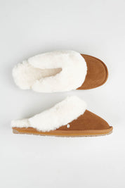 A model wearing size 7 of the Jolie Sheepskin Slipper in colour Chestnut, from the front, showing the whole outfit