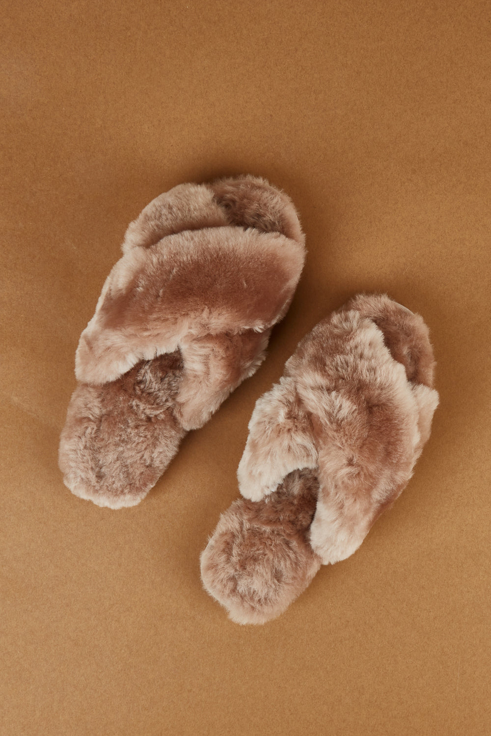 A model wearing size 7 of the Mayberry Slipper Slide in colour Camel, from the front, showing the whole outfit