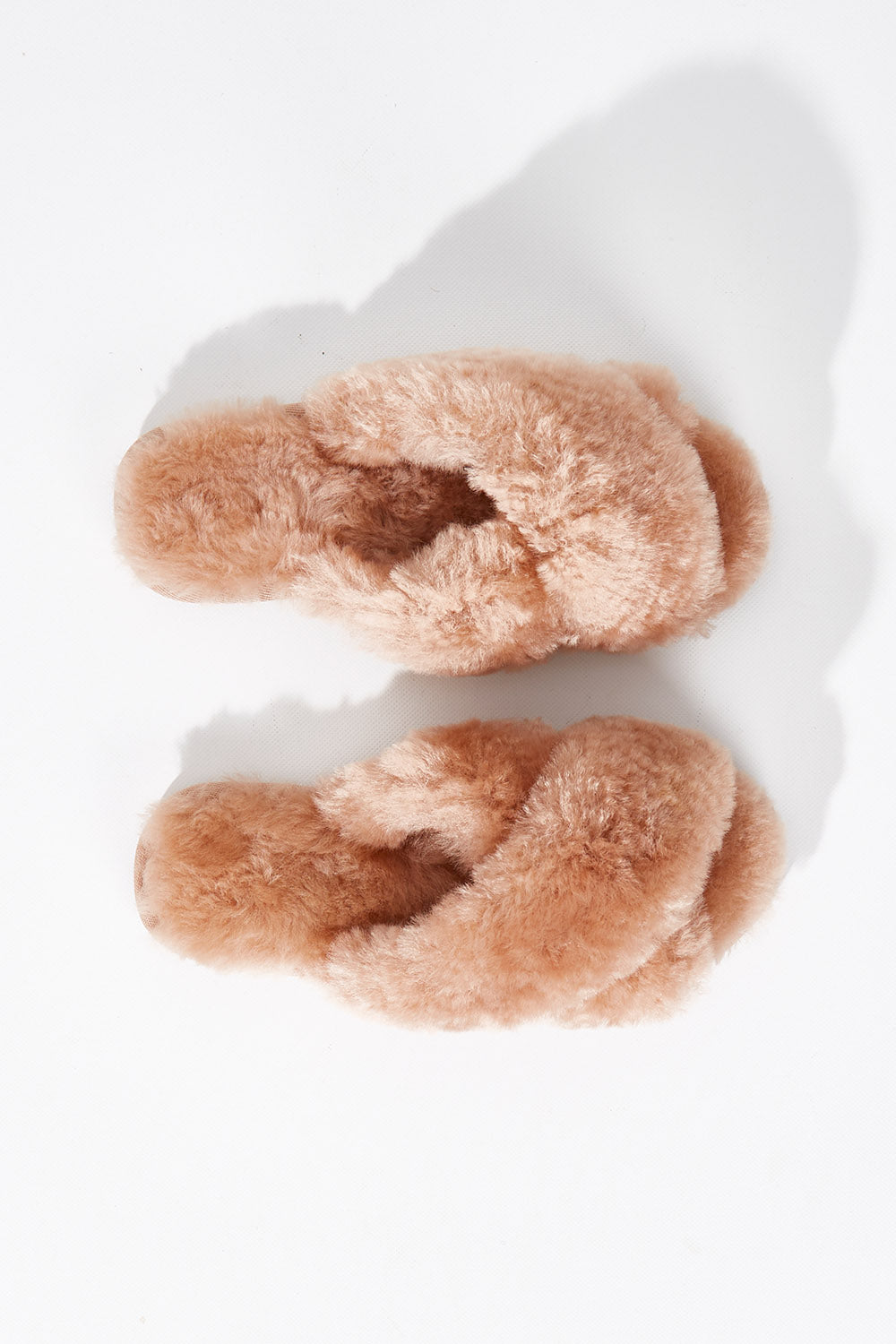 A model wearing size 7 of the Mayberry Slipper Slide in colour Camel, from the front, showing the whole outfit