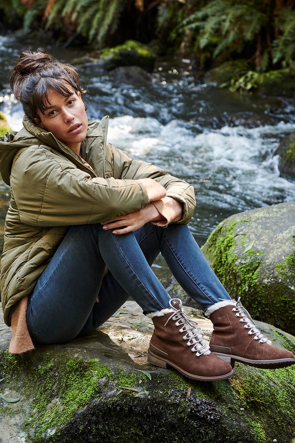 A model wearing the Billington Waterproof Boot in colour Oak, from the front, showing the whole outfit