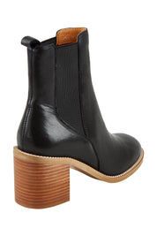 Product shot of the Chai Leather Ankle Boot in colour Black (Black), from the back
