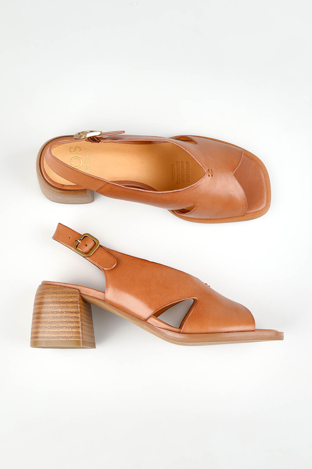 A model wearing size 37 of the Isadora Leather Heel in colour Brandy, from the front, showing the whole outfit