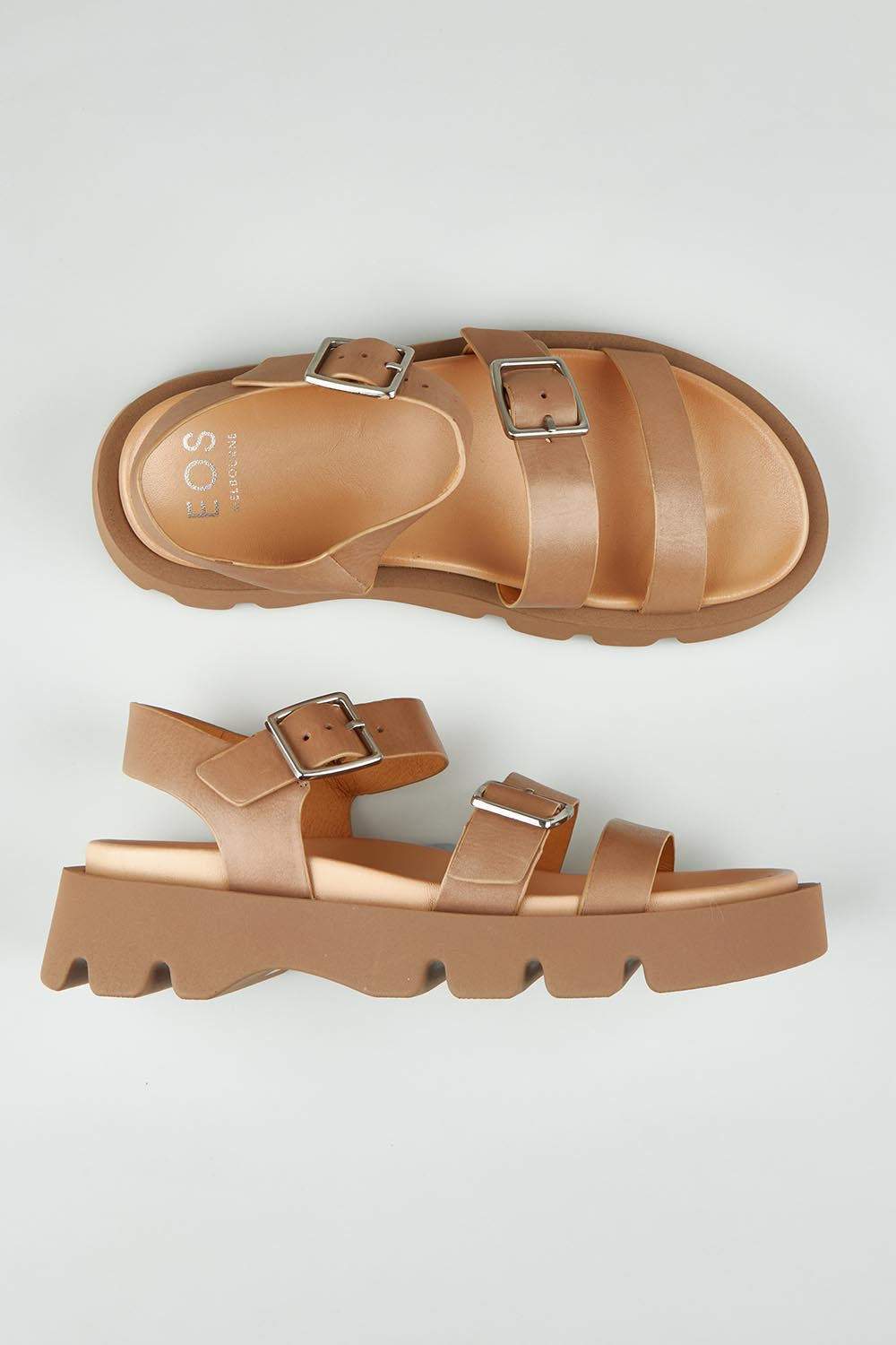 A model wearing size 37 of the Monn Leather Sandal in colour Taupe, from the front, showing the whole outfit