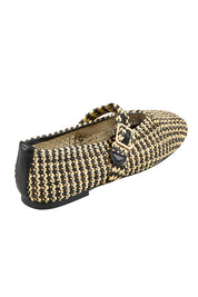 Product shot of the Santalum Flat - Black in colour Black, from the back