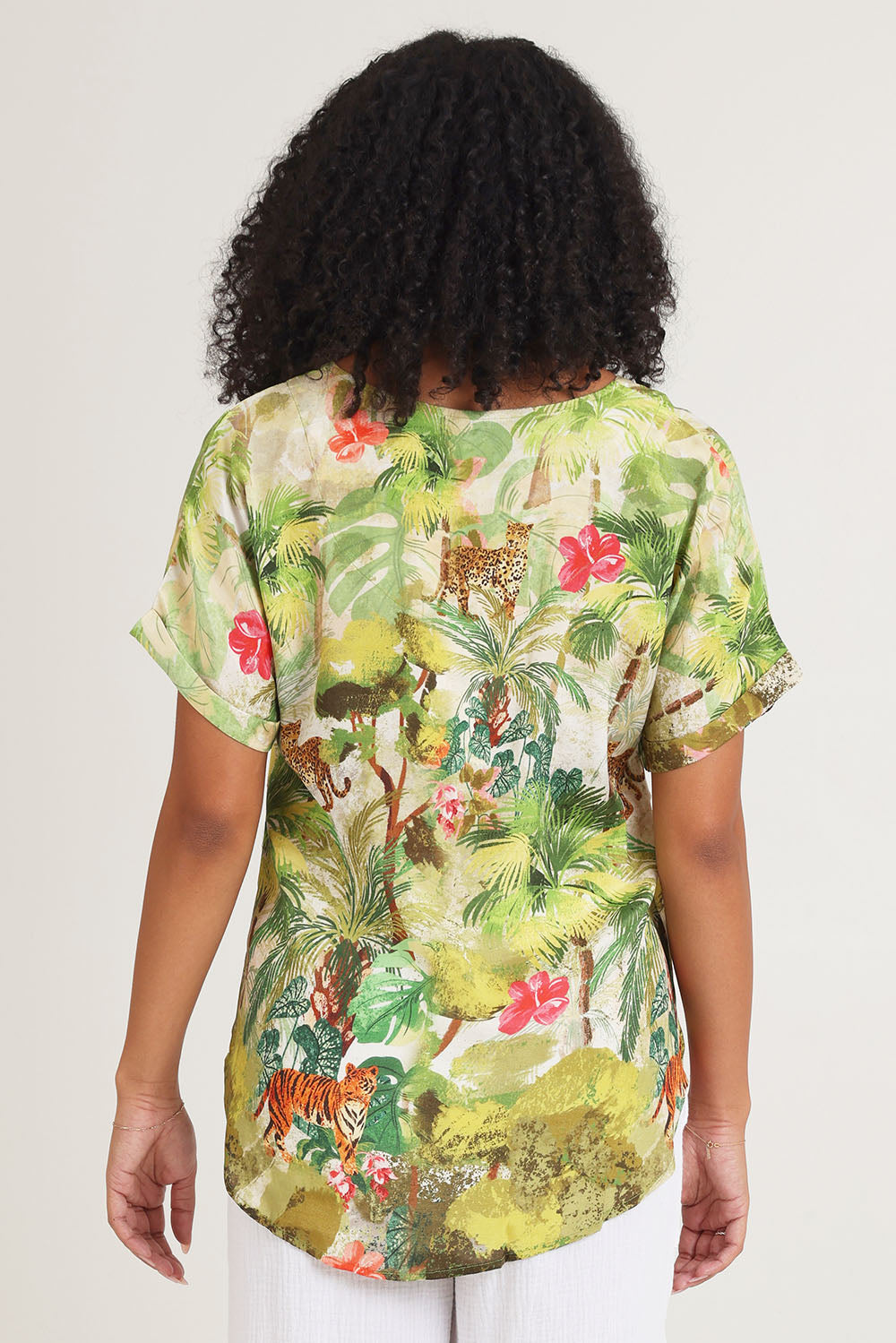 Model Ziara wearing size 10 of the Cecilla Short Sleeve Top in colour Print, from the back