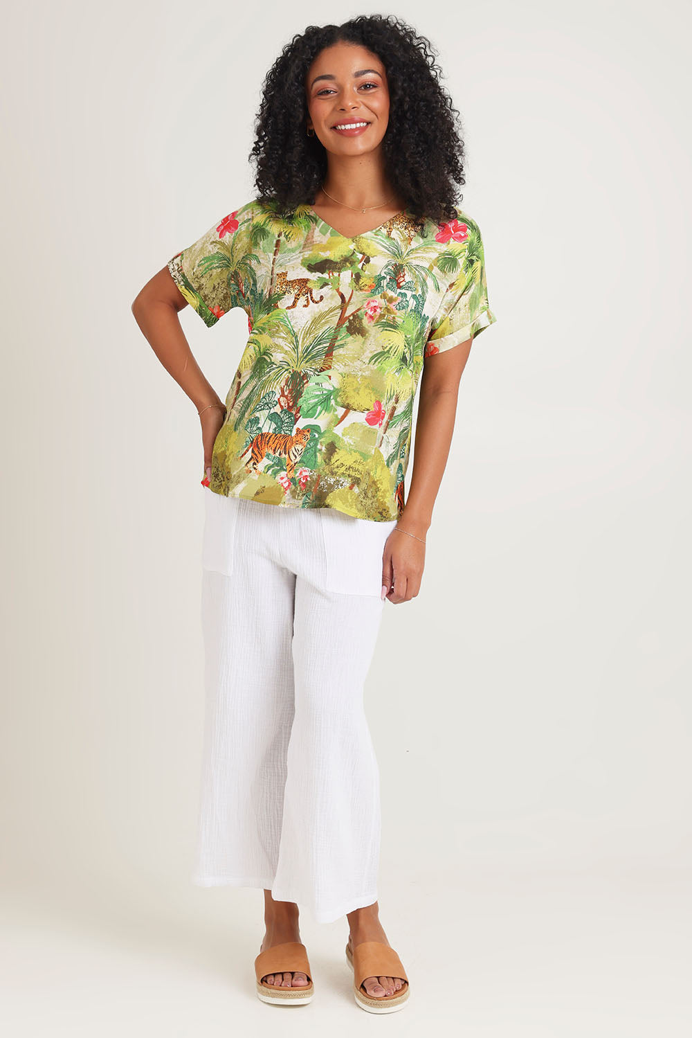 Model Ziara wearing size 10 of the Cecilla Short Sleeve Top in colour Print, from the front, showing the whole outfit