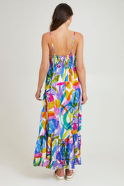 Model Madeline wearing size 10 of the Melinda White Maxi Strappy Dress in colour White (Blue), from the back