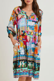 Model Madeline wearing size 10 of the Lana Layers 3/4 Sleeve Dress in colour Print (Blue), from the front, cropped image