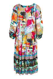 Product shot of the Lana Layers 3/4 Sleeve Dress in colour Print (Blue), from the back