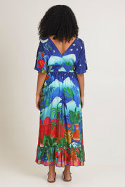Model Ziara wearing size 10 of the Arabian Nights Shirred Waist Dress in colour Print, from the back