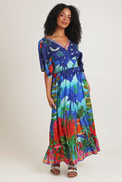 Model Ziara wearing size 10 of the Arabian Nights Shirred Waist Dress in colour Print, from the front, showing the whole outfit