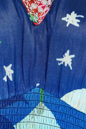 Product shot of the Arabian Nights Shirred Waist Dress in colour Print, detail