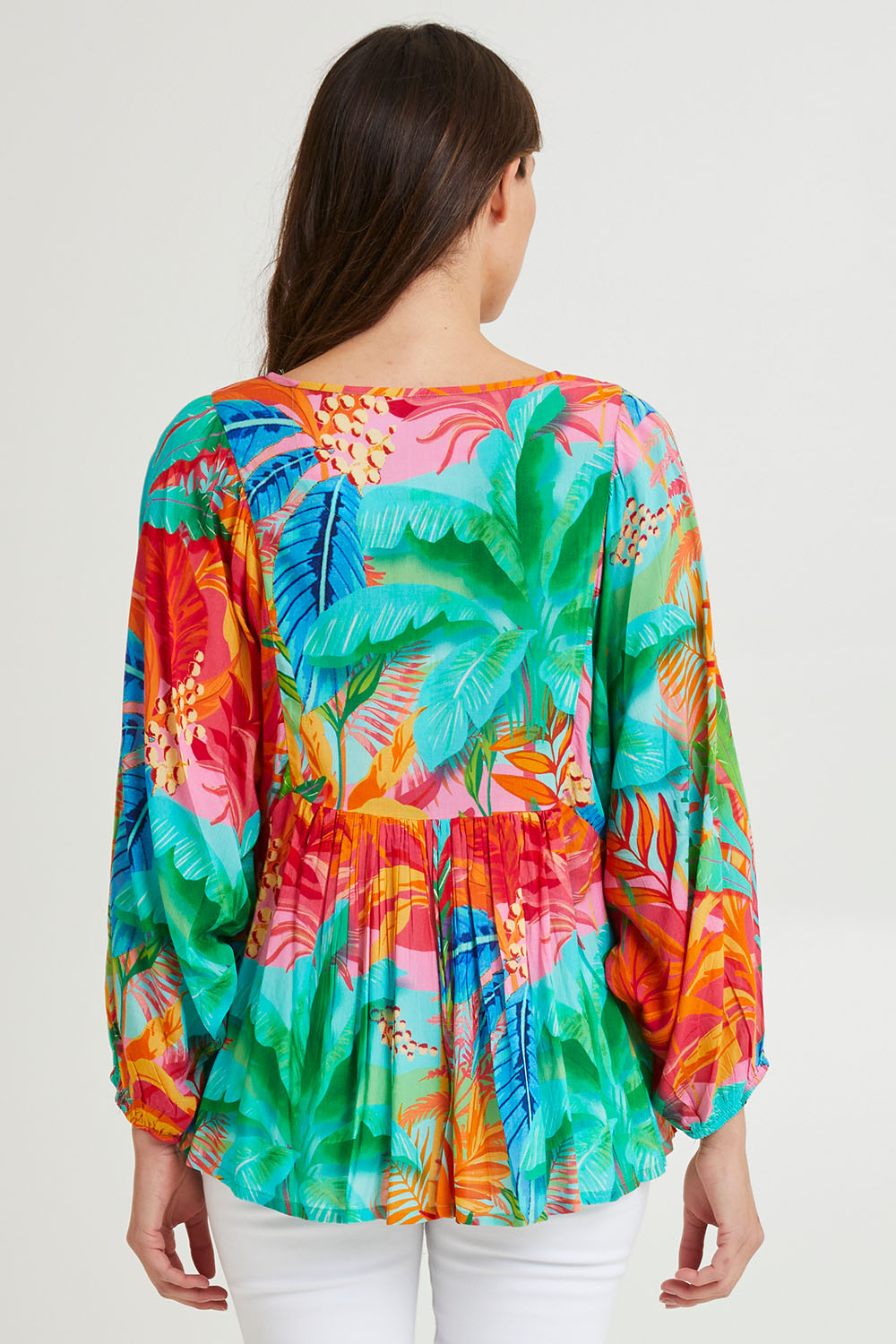 Model Madeline wearing size 10 of the Alisa Boho Top in colour Print (Green), from the back
