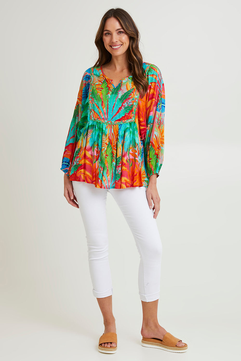 Model Madeline wearing size 10 of the Alisa Boho Top in colour Print (Green), from the front, showing the whole outfit