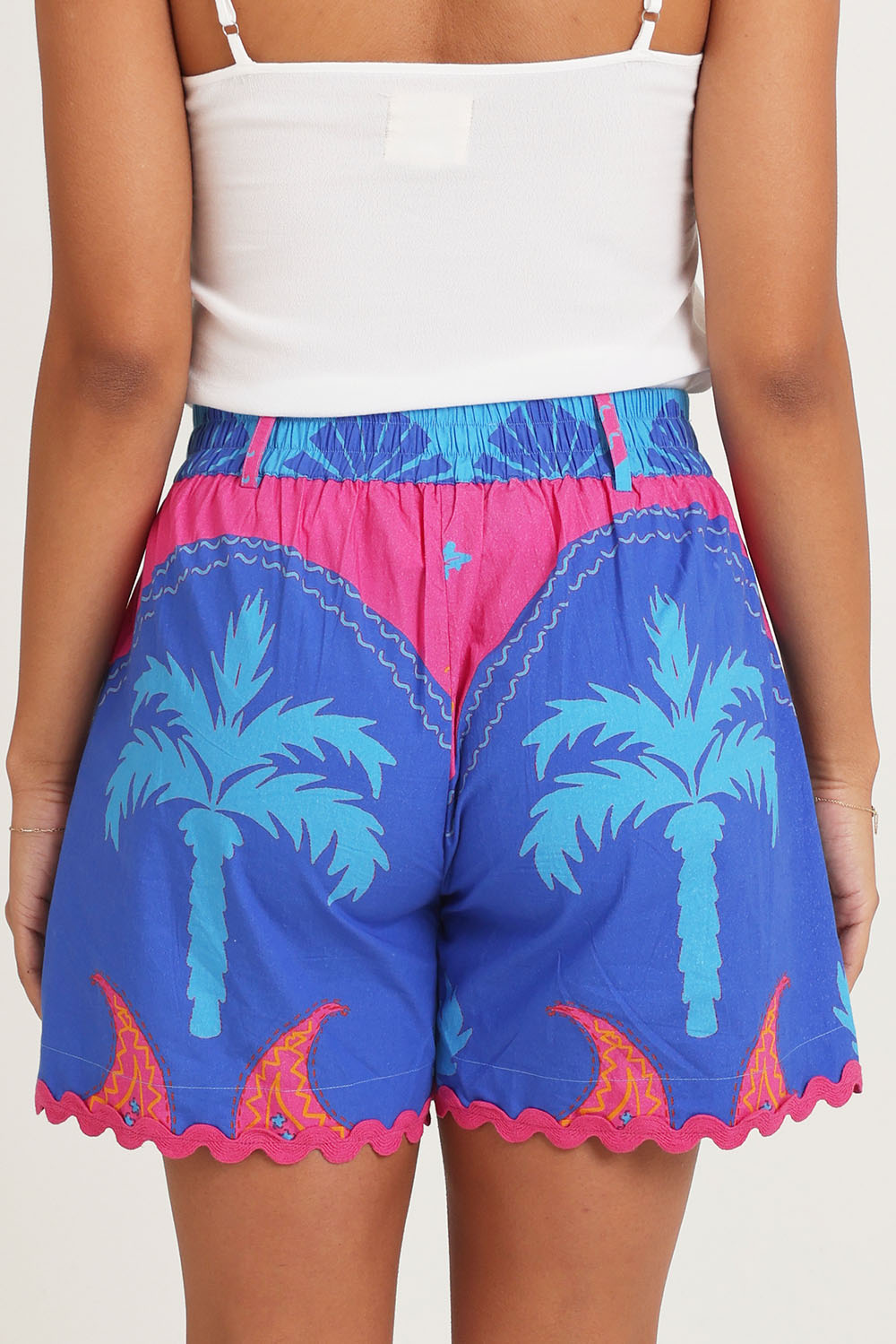 Model Ziara wearing size 10 of the Celestial Blue Cotton Shorts in colour Blue, from the back