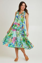 Model Madeline wearing size 10 of the Darcie Boho Sleeveless Dress in colour Print (Green), from the front, showing the whole outfit