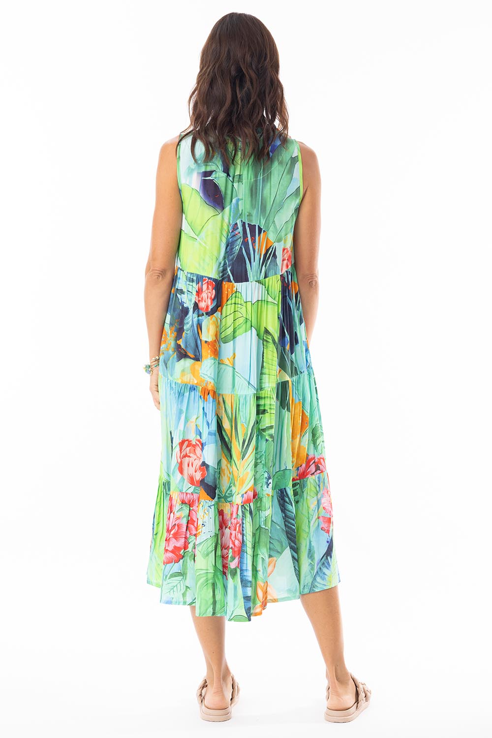 A model wearing the Evelyn Sleeveless Tie Dress in colour Print, from the back