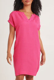 Model Ziara wearing size 10 of the Linen Blend Solid Shift Dress in colour Hotpink (Pink), from the front, cropped image