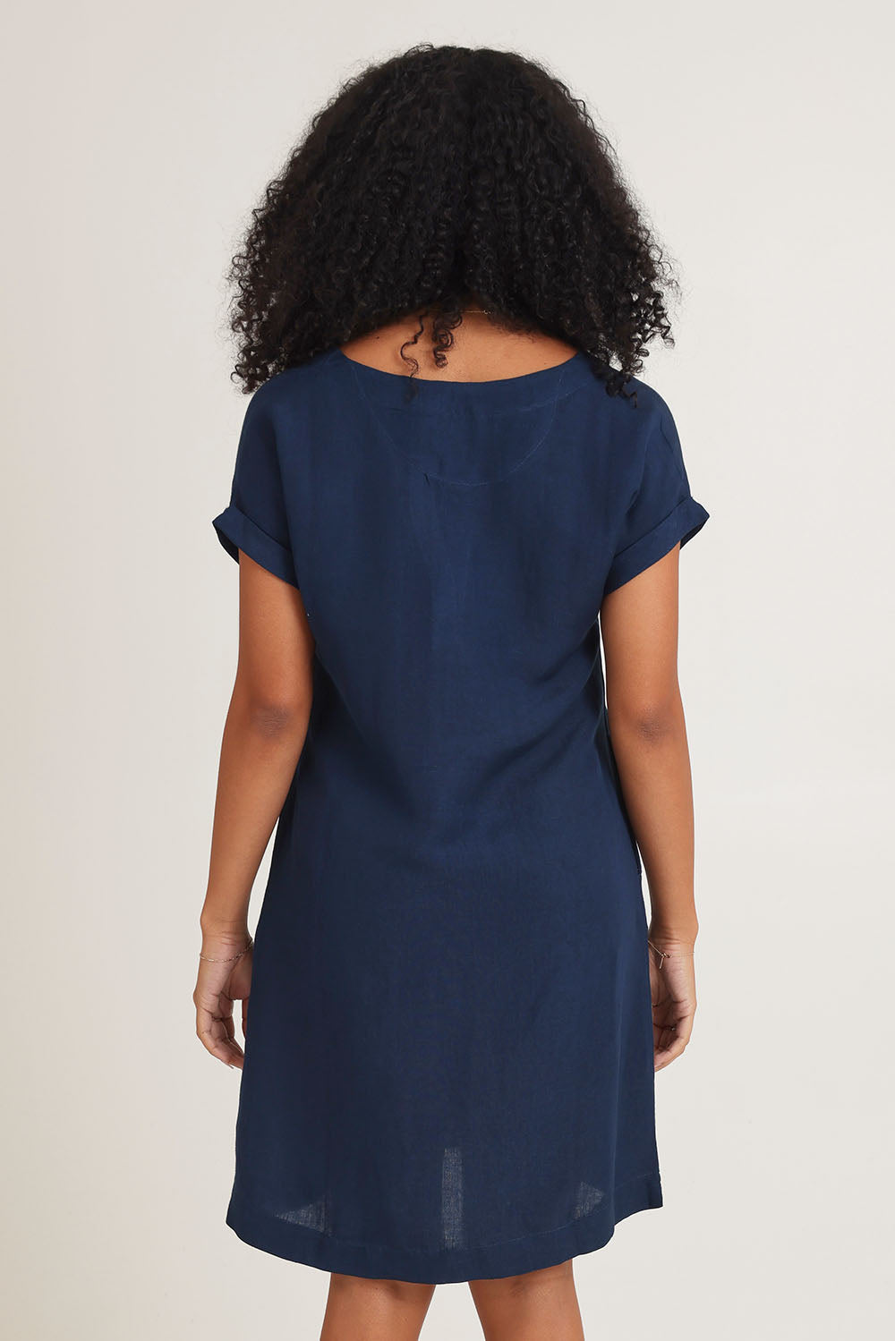Model Ziara wearing size 10 of the Linen Blend Solid Shift Dress in colour Navy (Blue), from the back