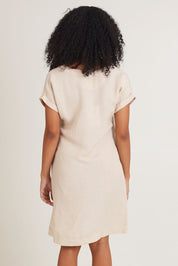 Model Ziara wearing size 10 of the Linen Blend Solid Shift Dress in colour Sand, from the back