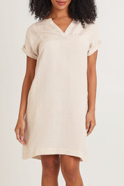 Model Ziara wearing size 10 of the Linen Blend Solid Shift Dress in colour Sand, from the front, cropped image
