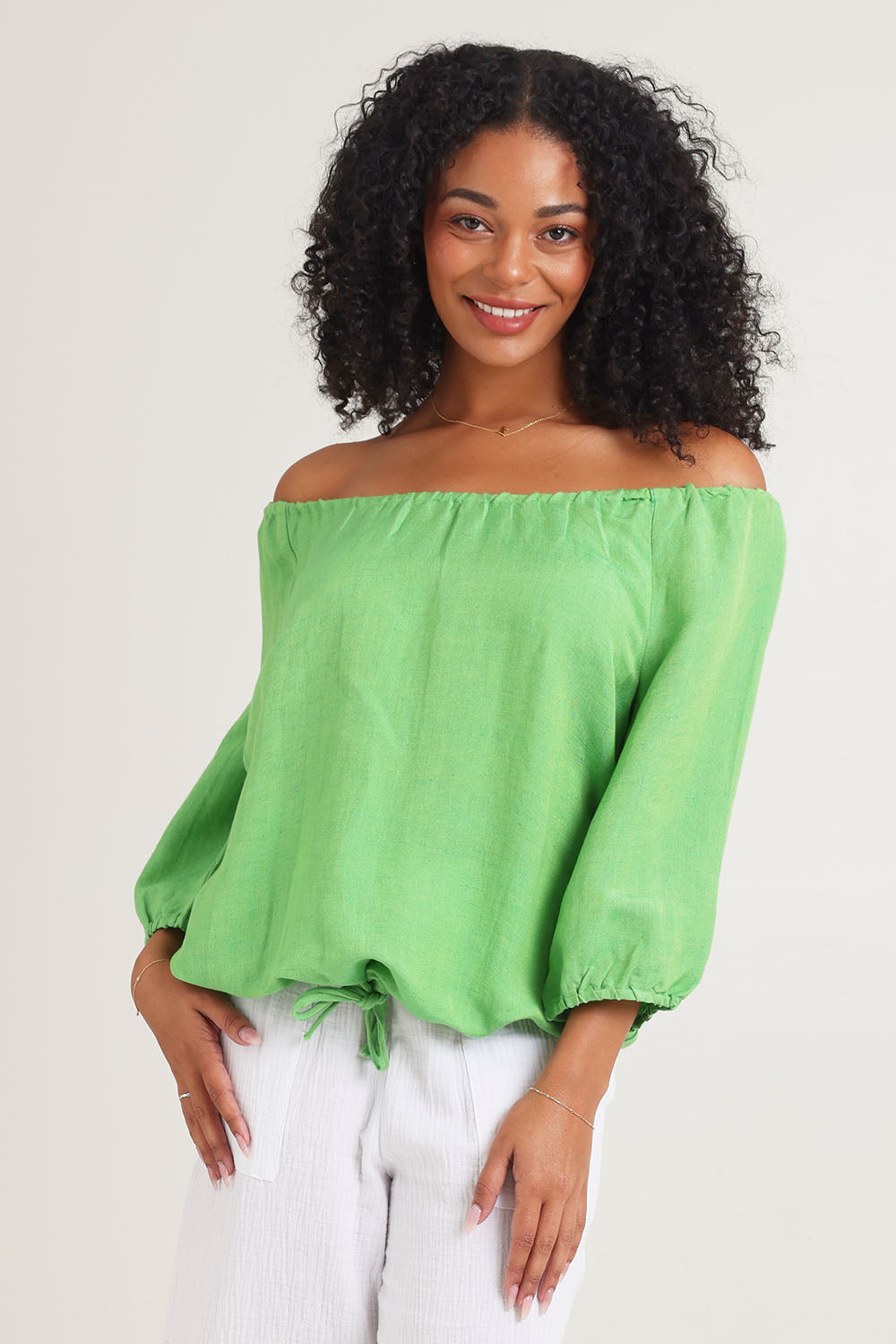 Model Ziara wearing size 10 of the Gather Neck 3/4 Sleeve Linen Blend Top in colour Green (Green), from the back