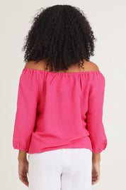 Model Ziara wearing size 10 of the Gather Neck 3/4 Sleeve Linen Blend Top in colour Hotpink (Blue), from the back