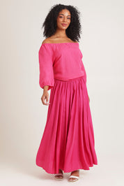 Model Ziara wearing size 10 of the Gather Neck 3/4 Sleeve Linen Blend Top in colour Hotpink (Blue), from the front, showing the whole outfit