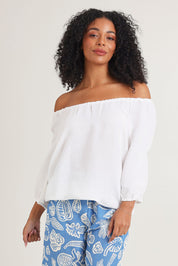 Model Ziara wearing size 10 of the Gather Neck 3/4 Sleeve Linen Blend Top in colour White (White), from the front, cropped image