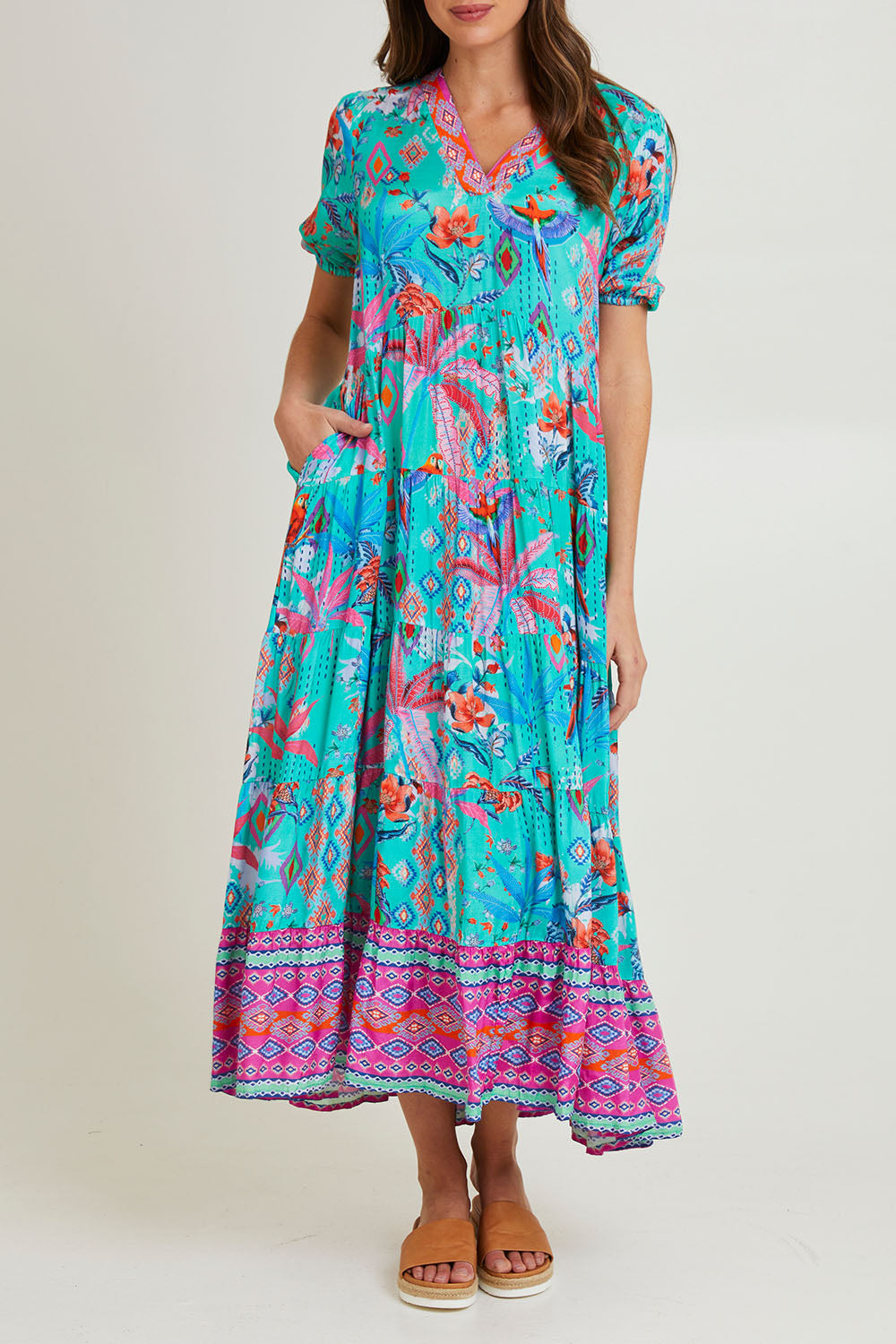 Model Madeline wearing size 10 of the Marina Maxi Dress in colour Print (Blue), from the front, cropped image