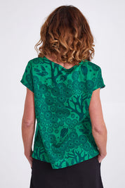Model Emma wearing size S of the Mikko Tilly Top in colour Emerald (Green), from the back