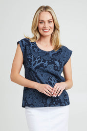 Model Grace wearing size S of the Bobby Top in colour Navy (Blue), from the front, cropped image