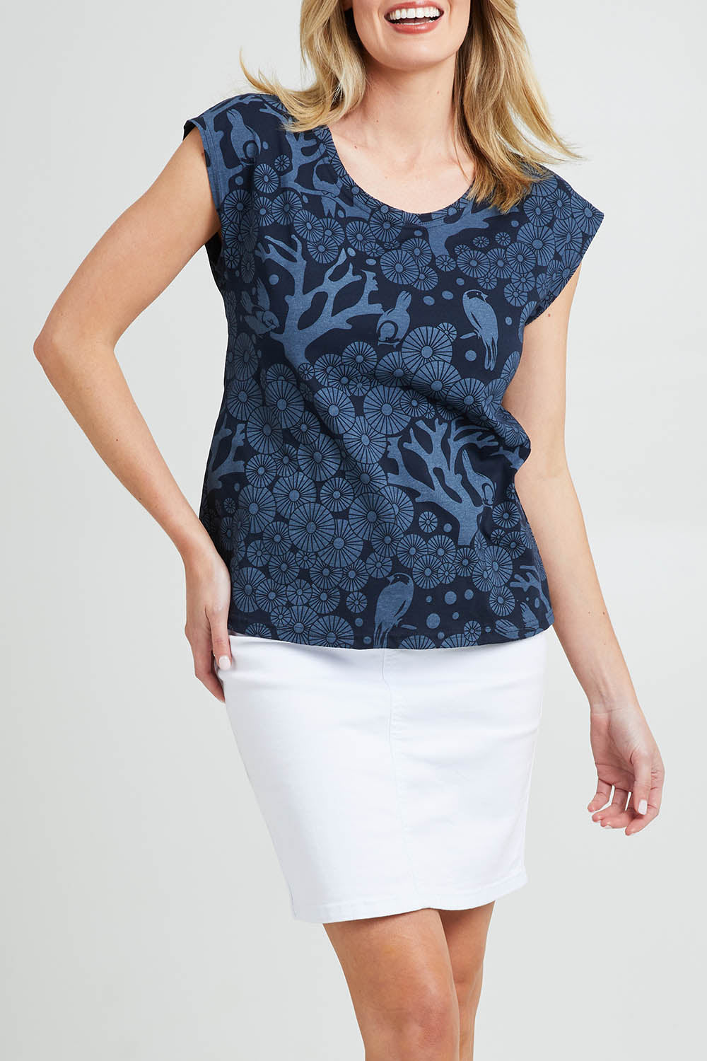 Model Grace wearing size S of the Bobby Top in colour Navy (Blue), from the front, cropped image