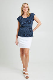 Model Grace wearing size S of the Bobby Top in colour Navy (Blue), from the front, showing the whole outfit