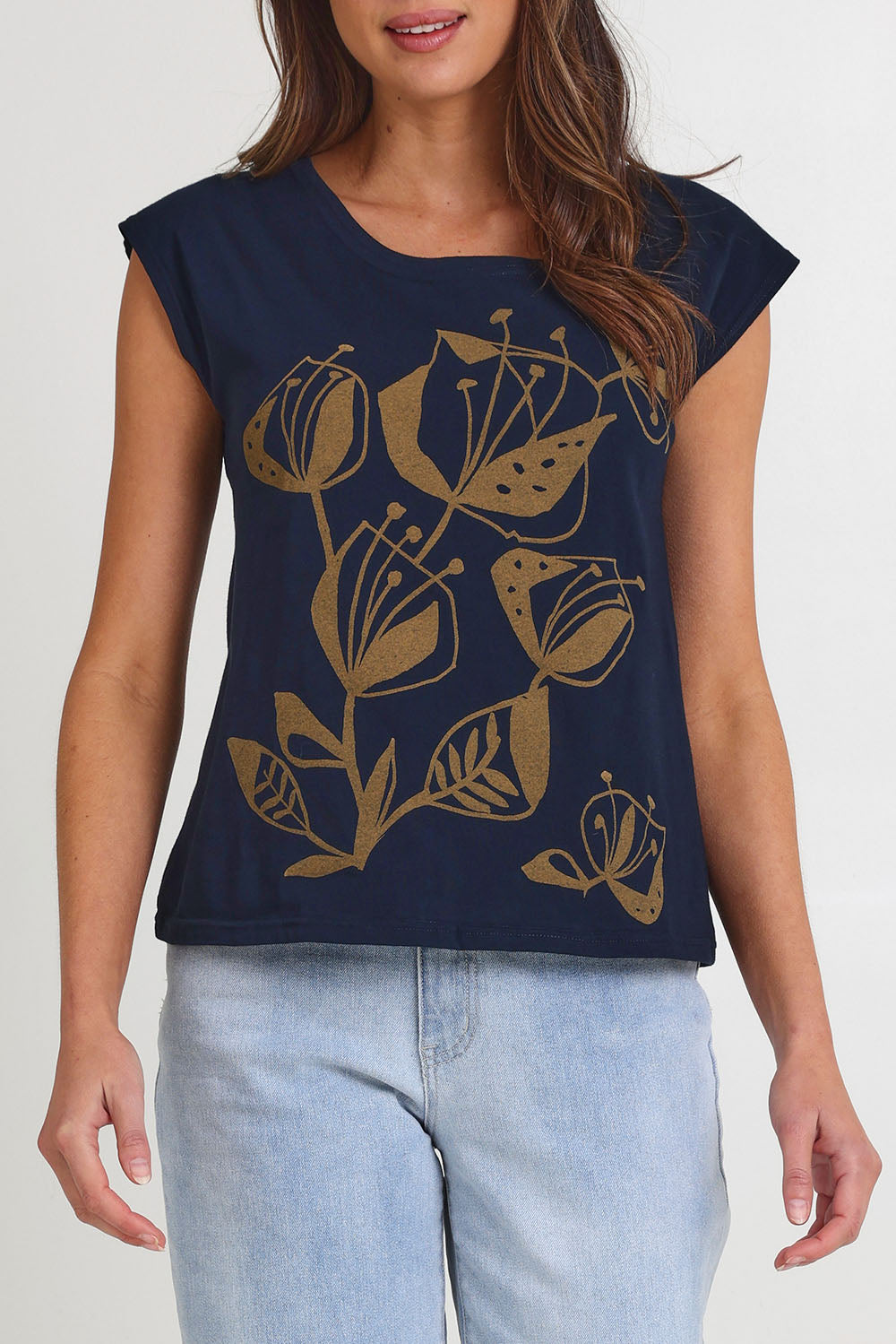 Model Madeline wearing the Bobby Cotton Top in colour Navylark (Blue), from the front, cropped image
