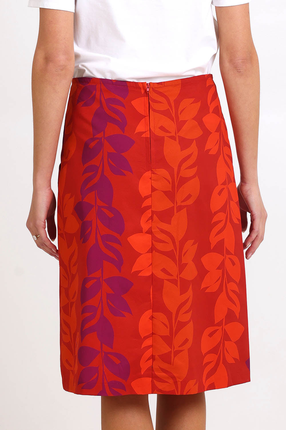 Model Madelinec wearing size 10 of the Heidi Long Skirt - Red in colour Red, from the back